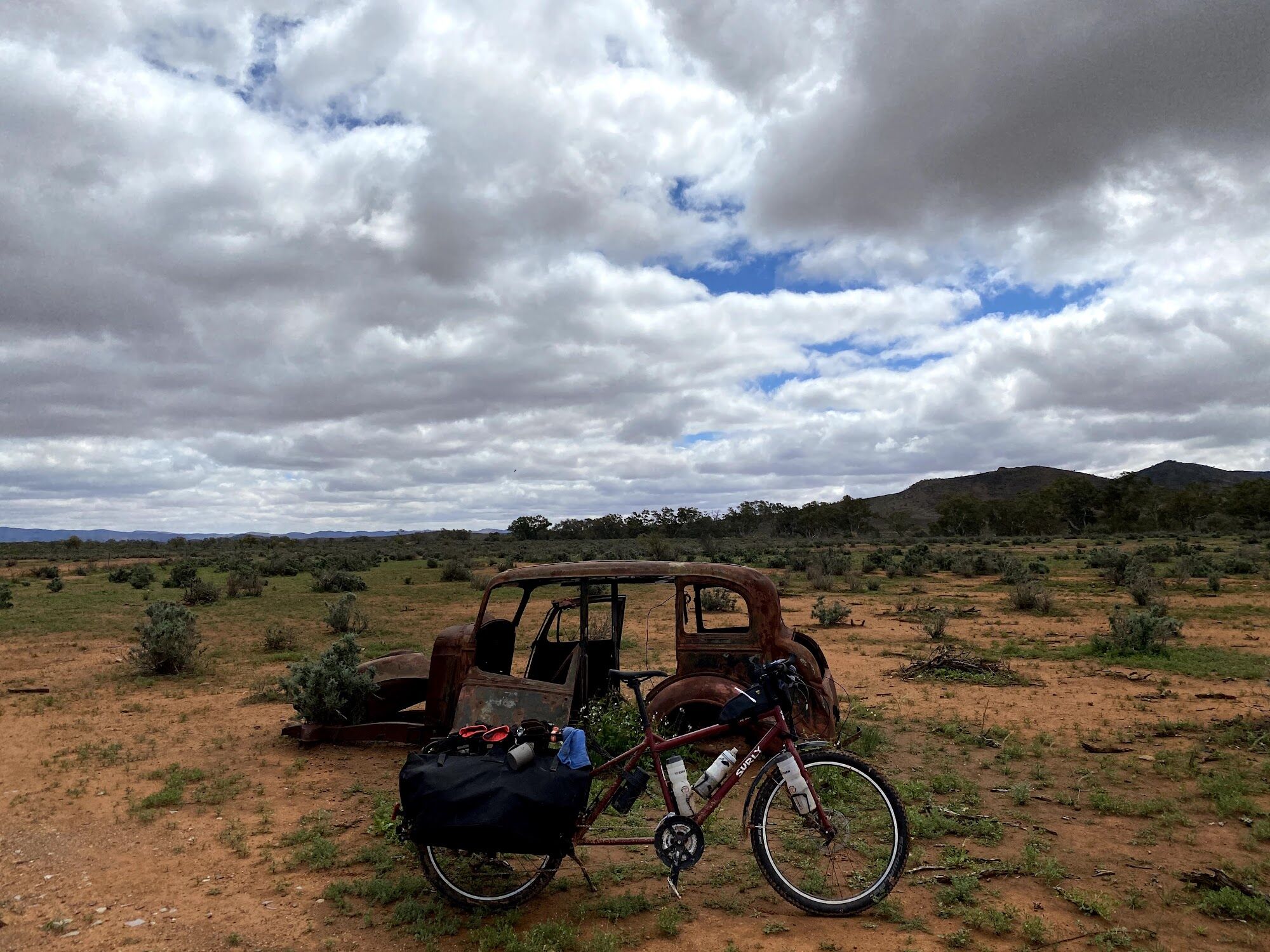 An old car wreck in the saltbush